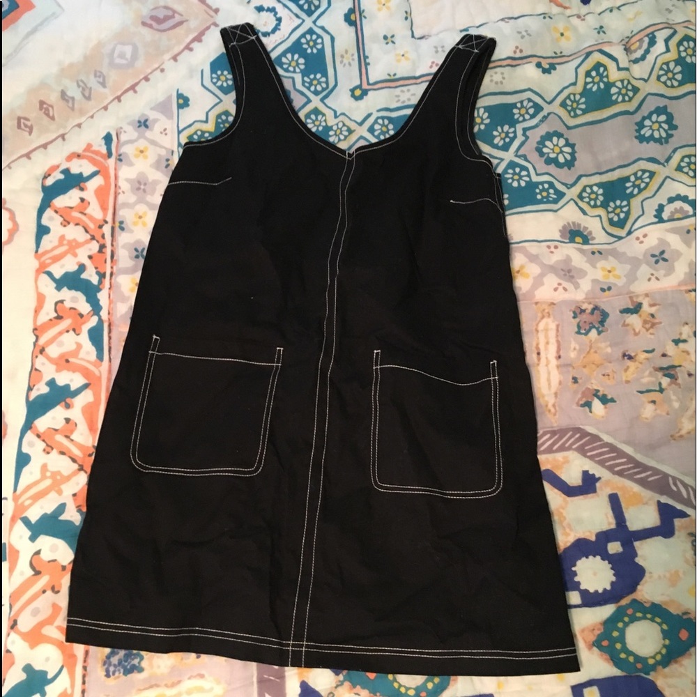 Black overall dress with pockets